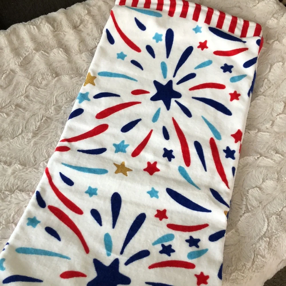 White Beach Towel with Red, Blue and Light Blue Starburst Print
